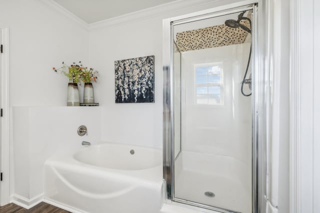 bathroom featuring hardwood / wood-style flooring, independent shower and bath, and crown molding