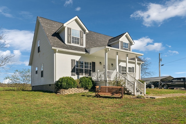 new england style home featuring covered porch, a front lawn, a carport, and roof with shingles