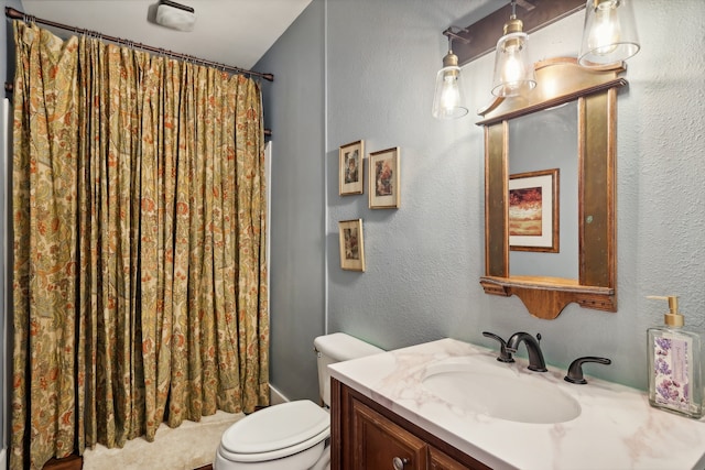 full bathroom featuring toilet, shower / bath combo, and vanity