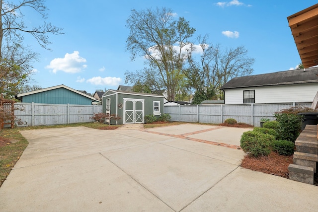 view of patio / terrace with a storage unit