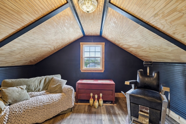 living area featuring hardwood / wood-style floors, wooden ceiling, and vaulted ceiling