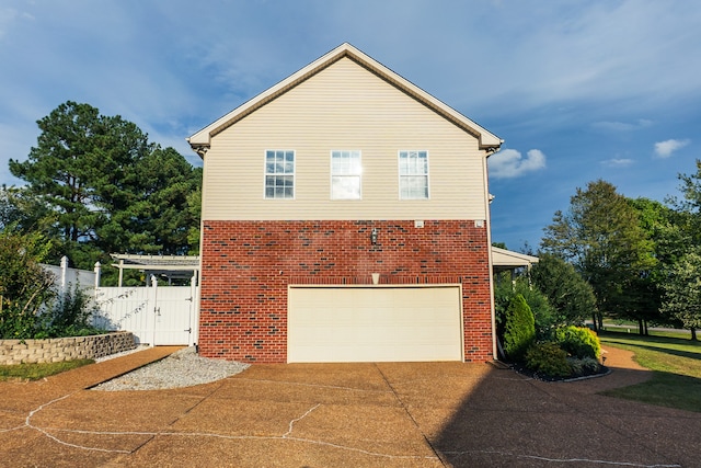 view of property exterior featuring a garage