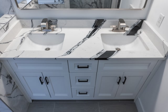 bathroom with vanity and tile patterned floors