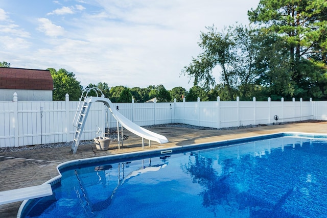 101 Brookstone Dr, Burns, TN 37029 - view of pool with fence, a water slide, and a fenced in pool