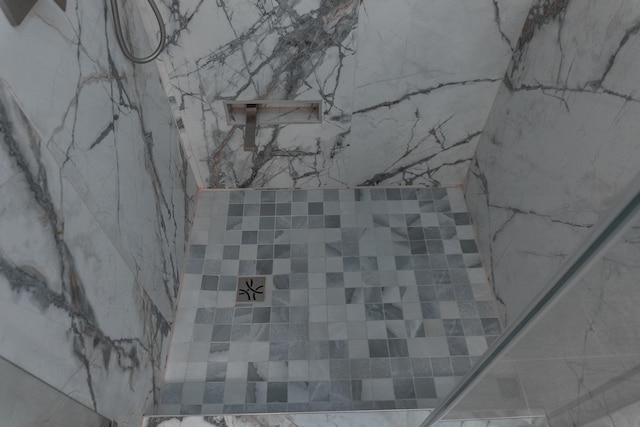 room details with a tile shower