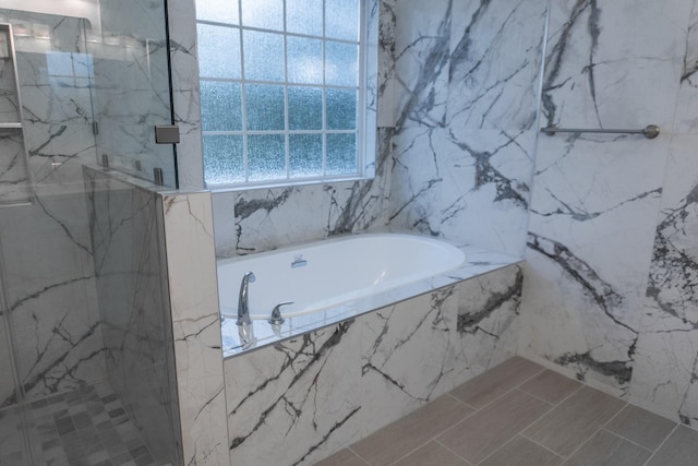 101 Brookstone Dr, Burns, TN 37029 - full bath featuring a marble finish shower and a bath