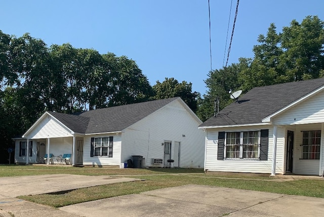 view of home's exterior featuring a yard