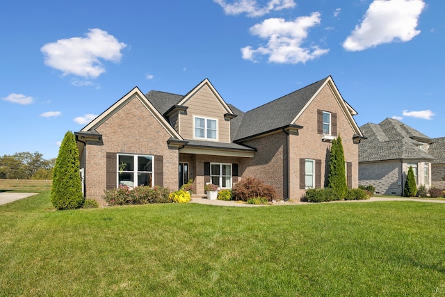 view of front of home featuring a front yard