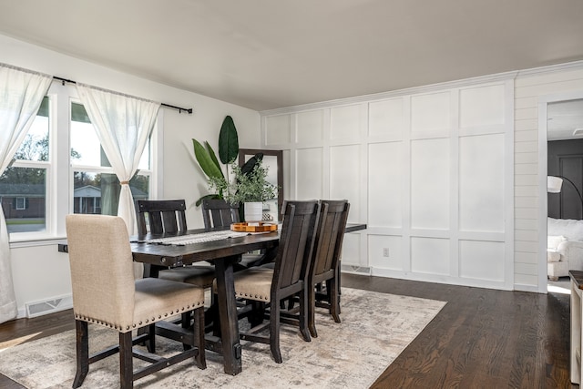 dining room featuring dark wood-type flooring