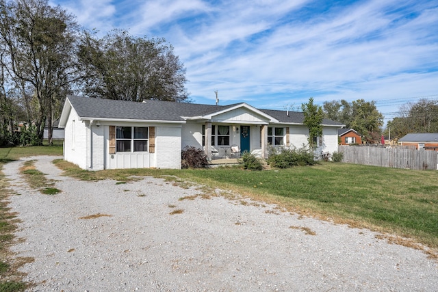 ranch-style house with a front yard