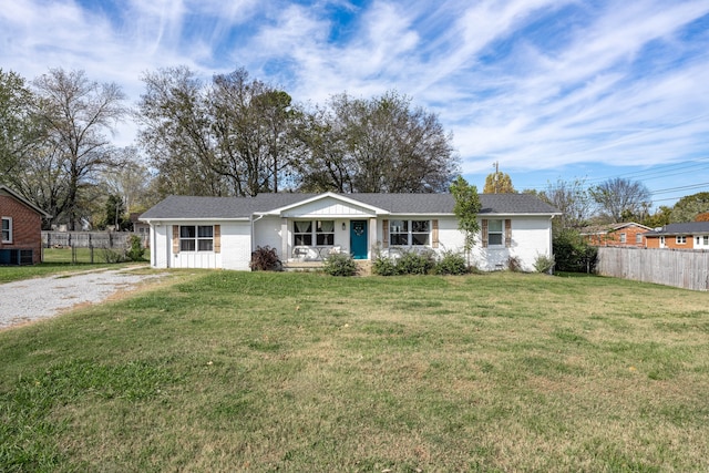 single story home featuring a front yard