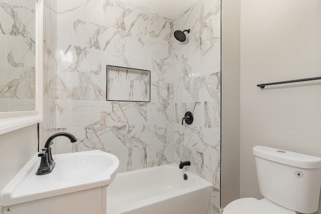 full bathroom featuring vanity, toilet, and tiled shower / bath combo