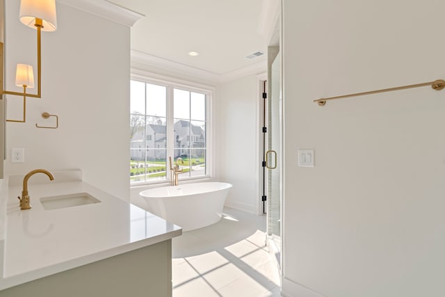 bathroom featuring crown molding, tile patterned floors, vanity, and separate shower and tub