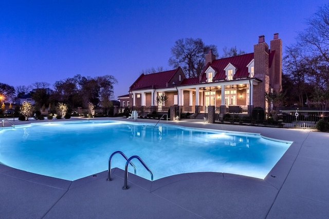 view of pool featuring a patio area