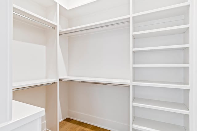 walk in closet featuring light wood-type flooring