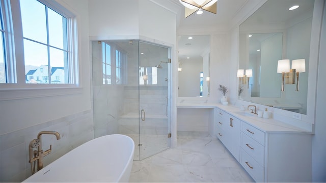 bathroom featuring independent shower and bath, vanity, and crown molding