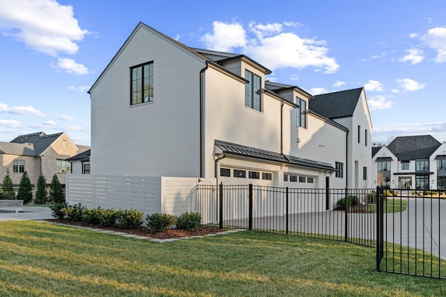 view of home's exterior with a yard