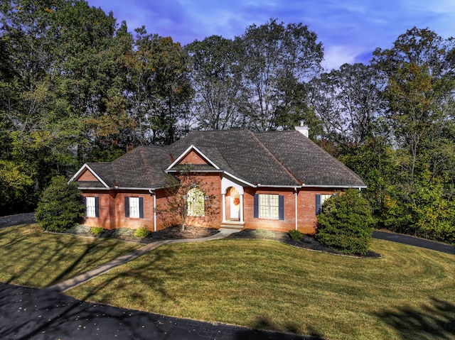 view of front of home featuring a yard