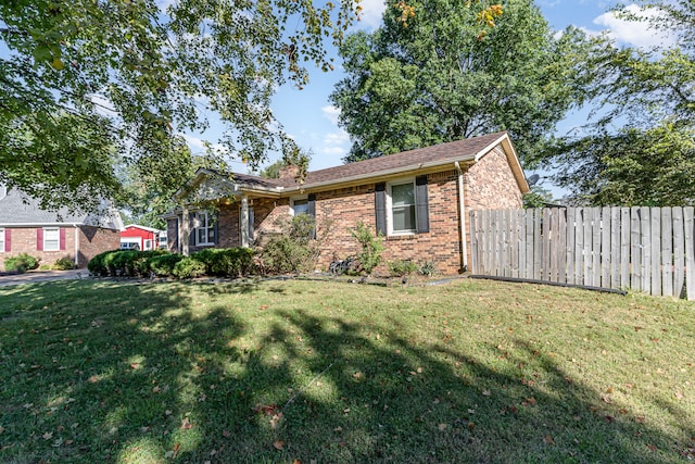 view of front of home featuring a front lawn