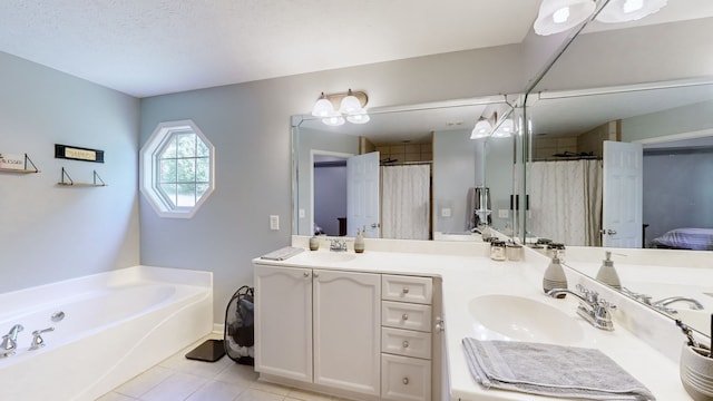 bathroom featuring vanity, tile patterned floors, a textured ceiling, and plus walk in shower