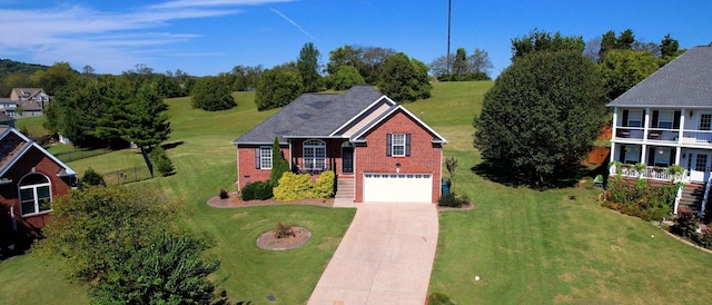 view of front of property featuring a front lawn and a garage