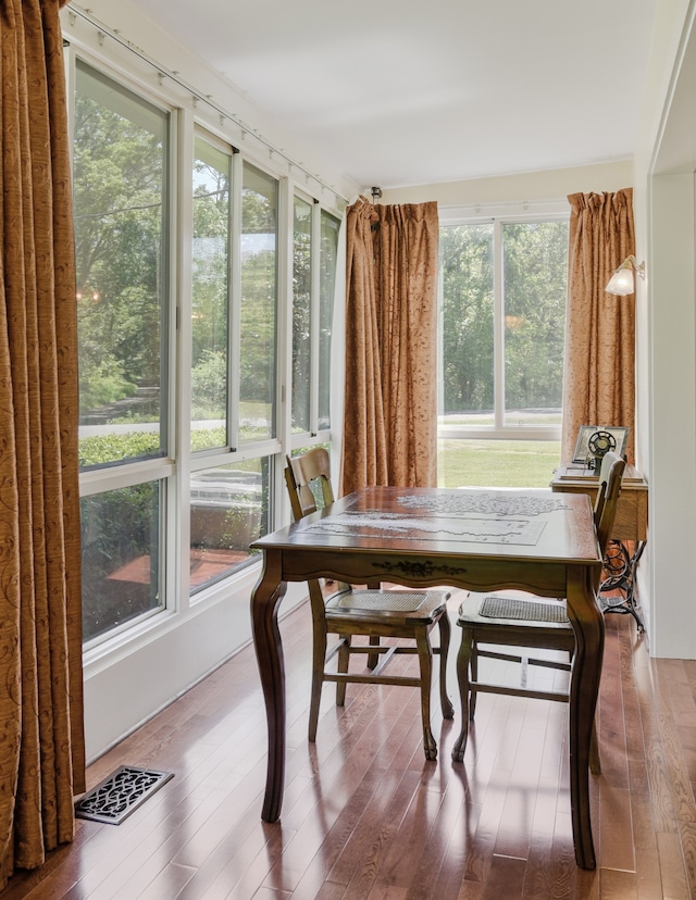 sunroom / solarium featuring plenty of natural light