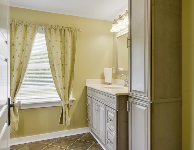 bathroom featuring vanity and tile patterned flooring