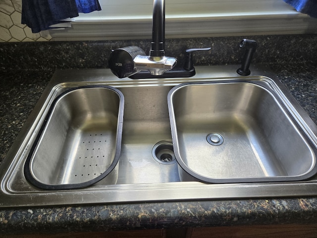 details with sink and dark stone counters