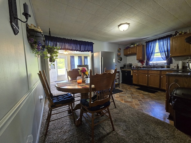 dining room featuring sink