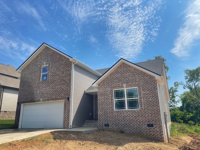 front facade with a garage