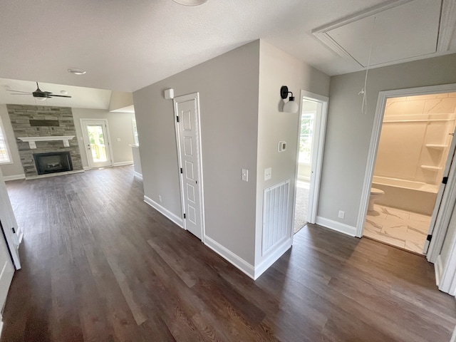 hall featuring dark wood-type flooring