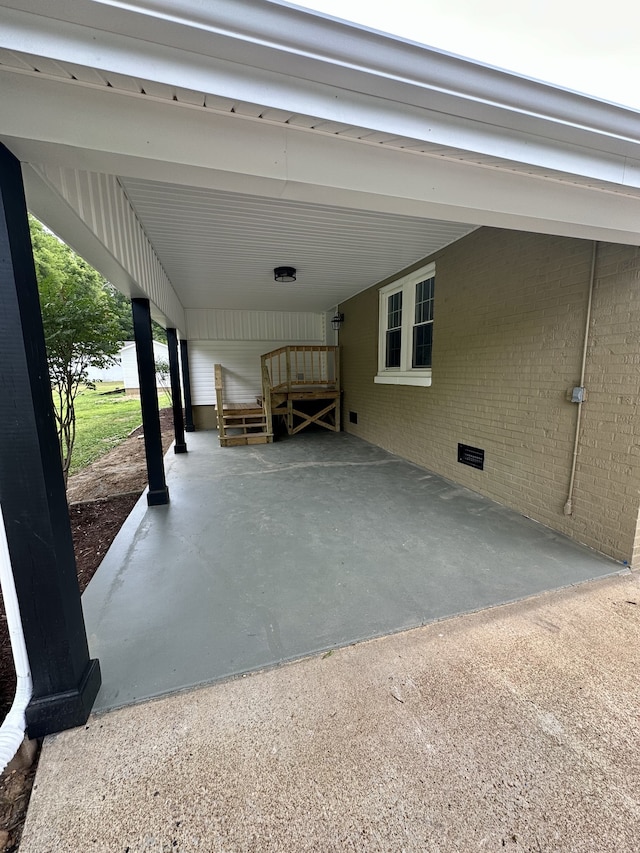 view of parking with a carport