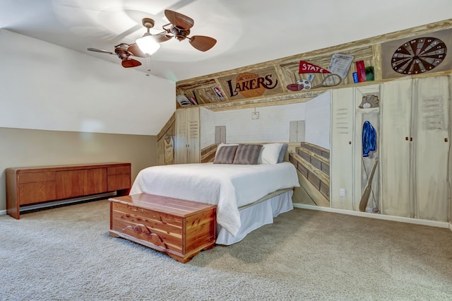 carpeted bedroom featuring vaulted ceiling and ceiling fan