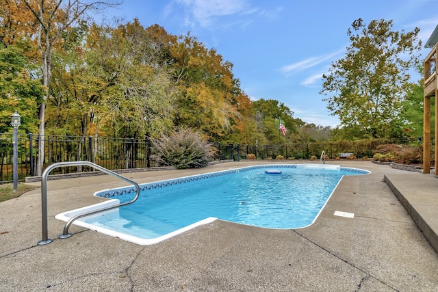 view of swimming pool featuring a patio area