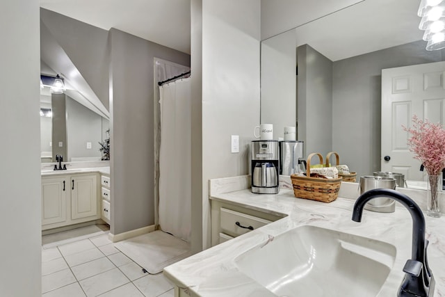 bathroom with vanity and tile patterned flooring