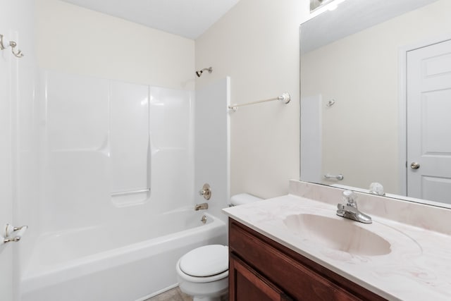 full bathroom featuring toilet, vanity, and  shower combination