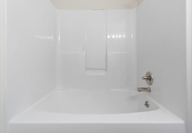 bathroom with shower / bathing tub combination