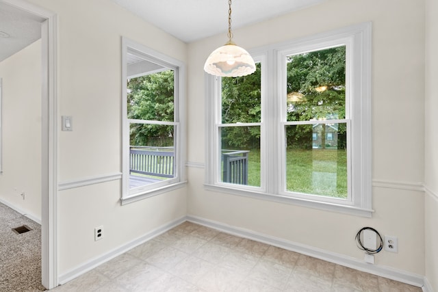 view of unfurnished dining area