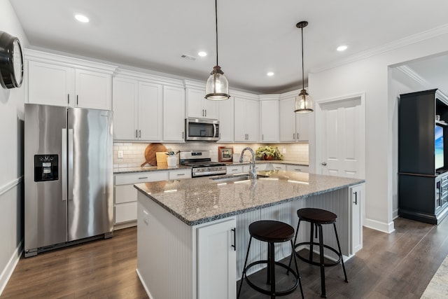 kitchen with white cabinetry, appliances with stainless steel finishes, sink, and dark wood-type flooring