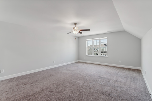 additional living space featuring lofted ceiling, carpet floors, and ceiling fan