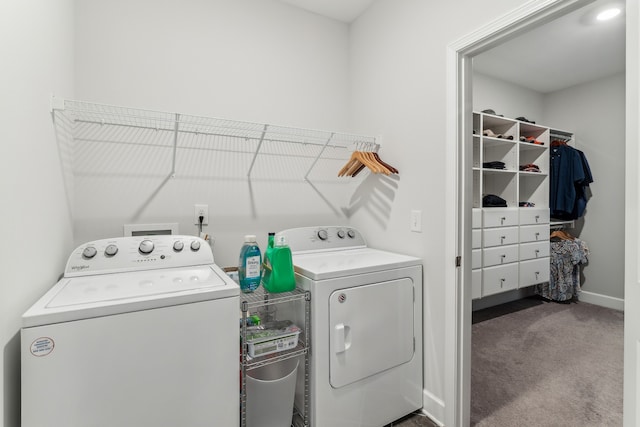 clothes washing area featuring carpet and washing machine and dryer