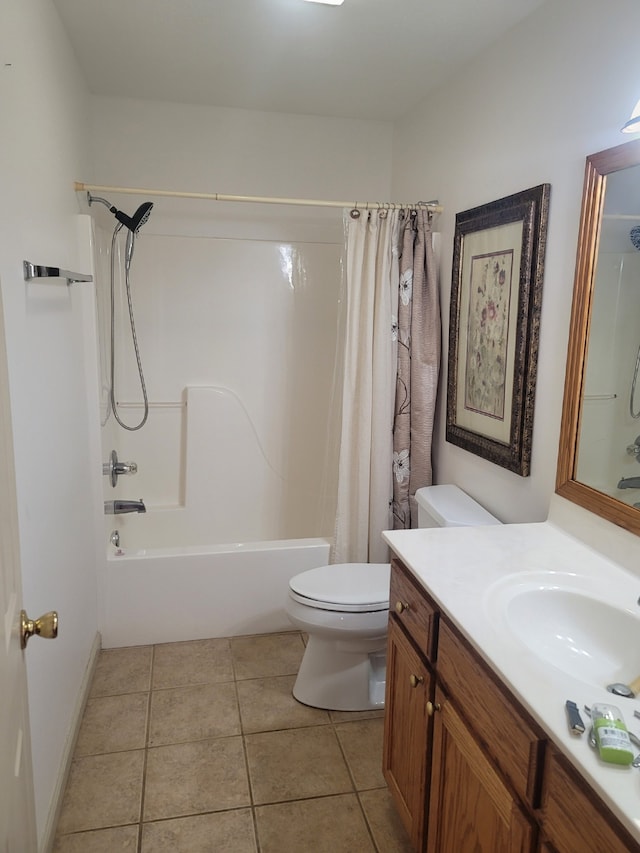 bathroom featuring shower / bathtub combination with curtain, toilet, vanity, and tile patterned flooring