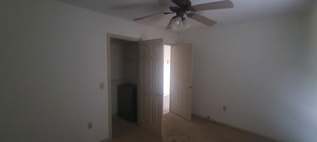 unfurnished bedroom with a ceiling fan