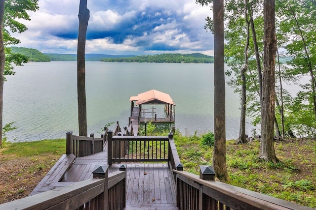 dock area featuring a water and mountain view