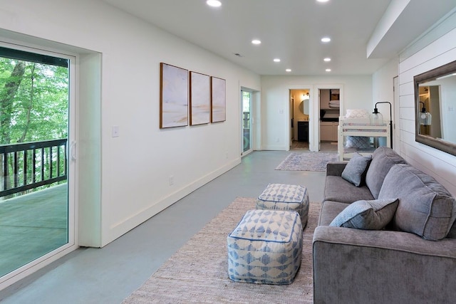 living room with concrete floors