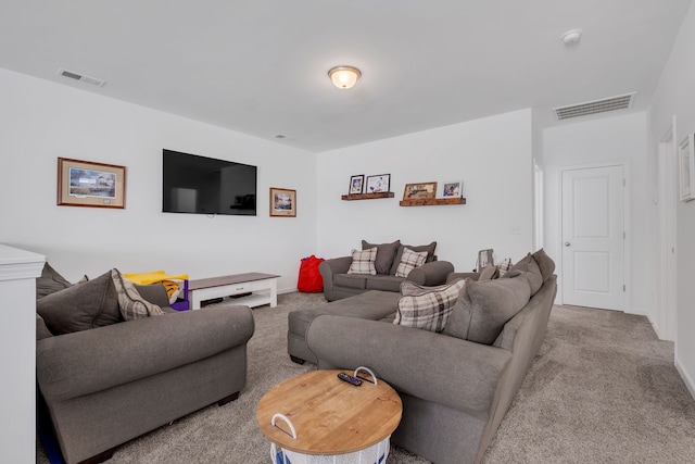 living room featuring light carpet