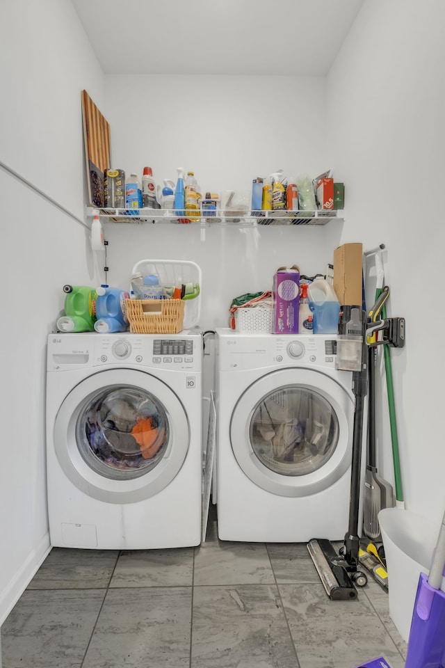 washroom featuring washer and dryer