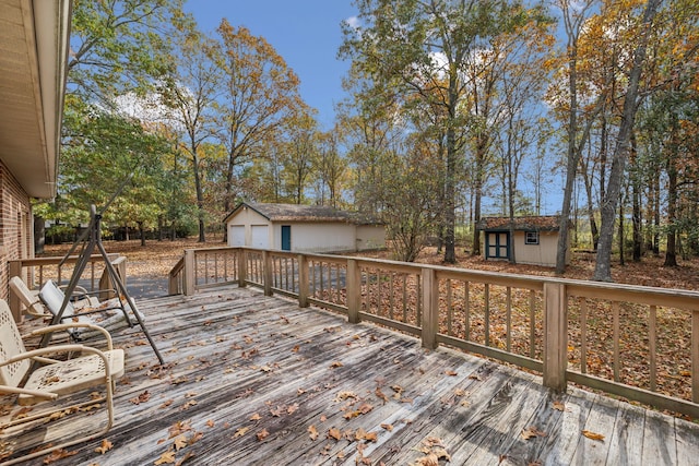 wooden deck with a storage shed