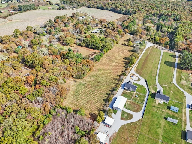 birds eye view of property with a rural view