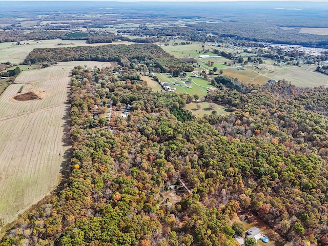 birds eye view of property featuring a rural view